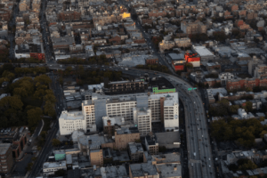 The Brooklyn-Queens Expressway separated the Hall Street shelter in Brooklyn from a nearby playground and more residential areas, drawing complaints from neighbors.